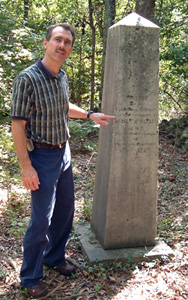 Jeff Archer at the grave of James O'Kelly near Durham, NC. Photo by Ferrell Jenkins, BiblicalStudies.info.